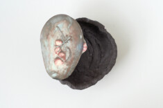 Humus. Black clay, glaze/porcelain/pigments, decals. 2022. 24 × 20 × 11cm. Sold.
